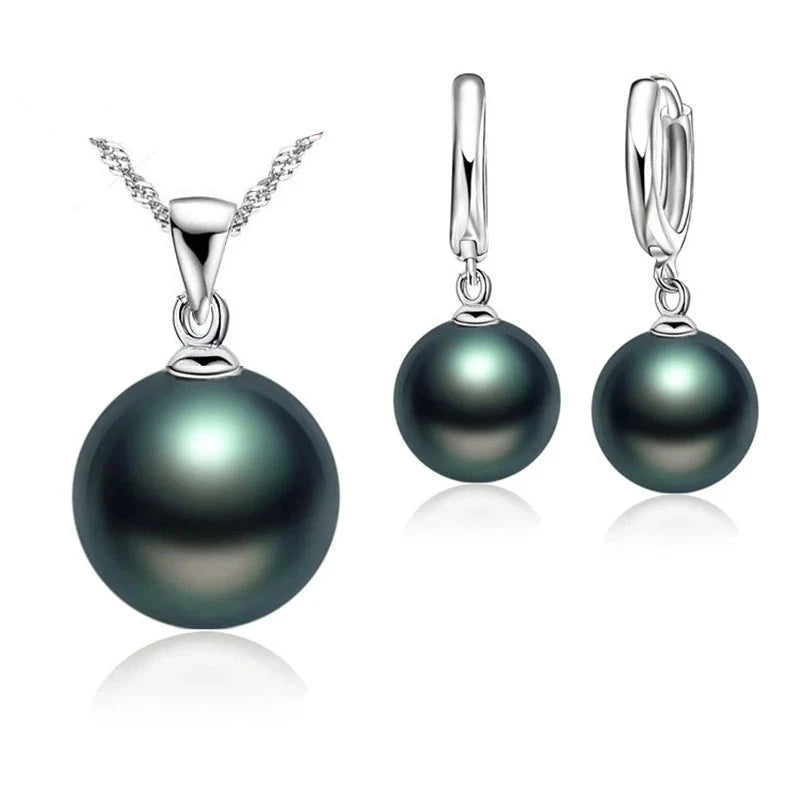 Lisa- Pearl earring and necklace set in sterling silver